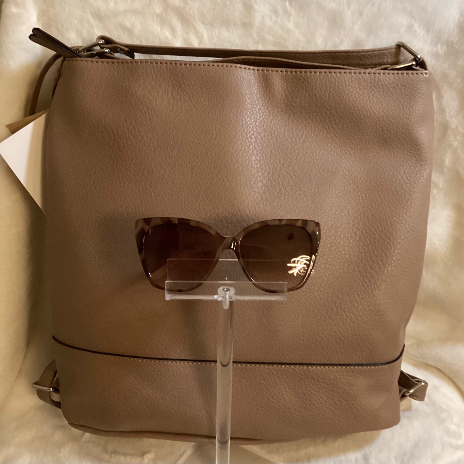 Taupe backpack with sunglasses