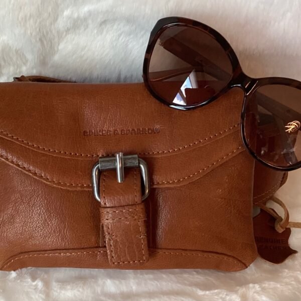Carmel leather waist bag with sunglasses