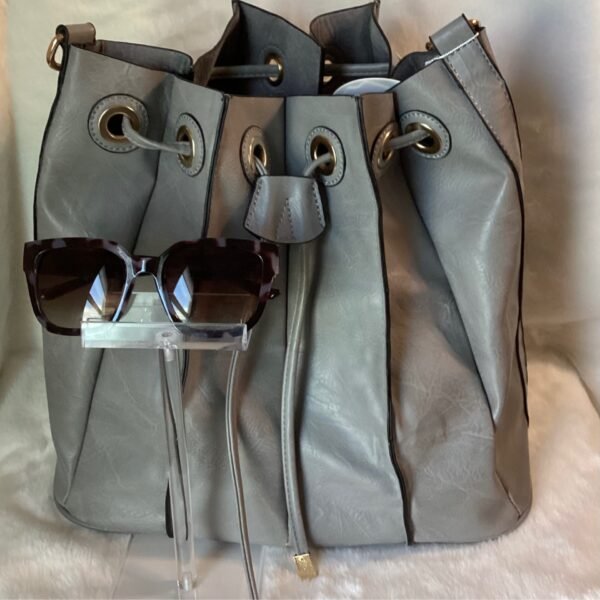 Gray drawstring bucket with sunglasses