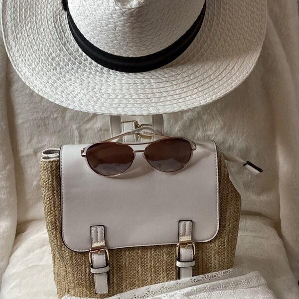 White beach pants with backpack and sunglasses