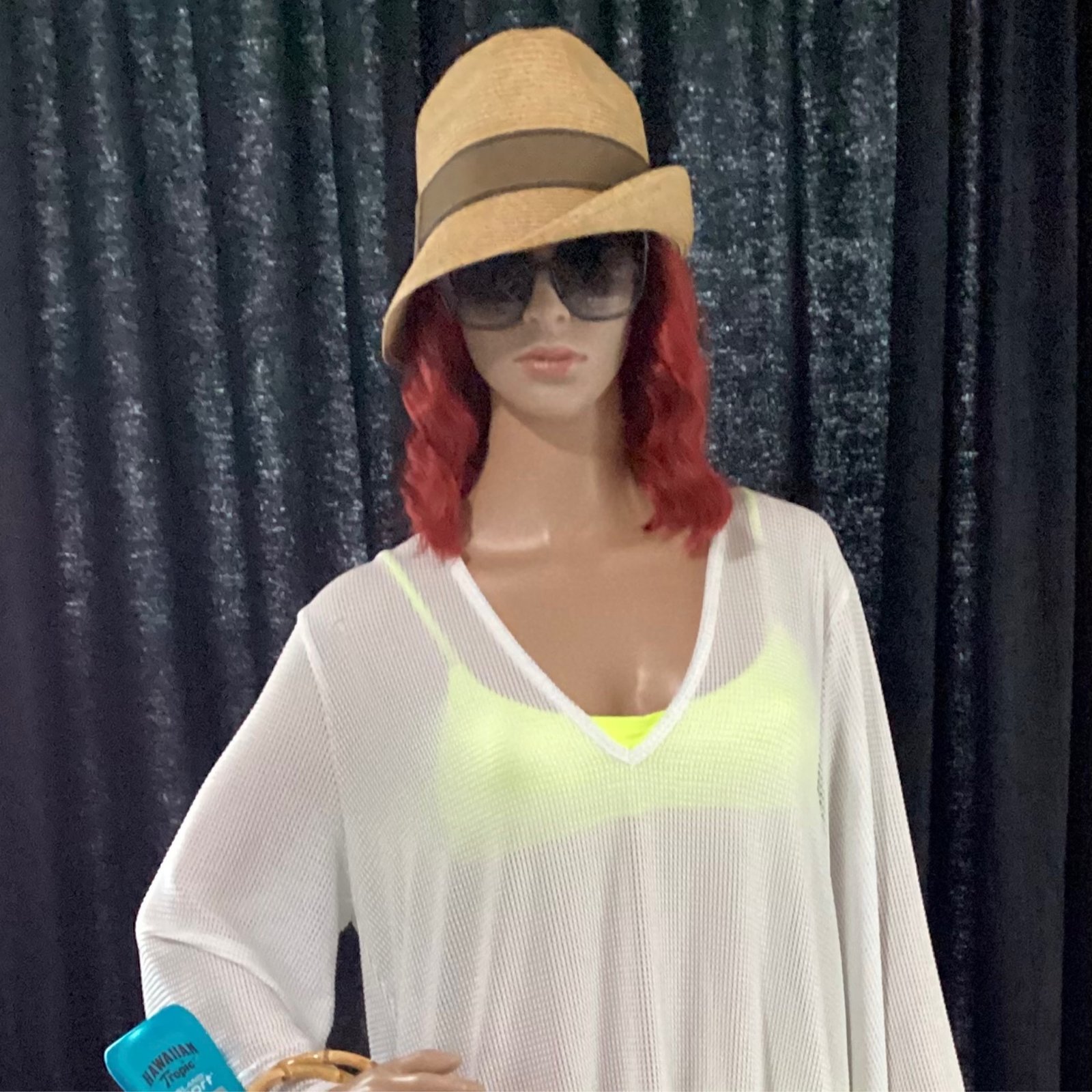 White fishnet beachwear cover with fedora and Tahari sunglasses