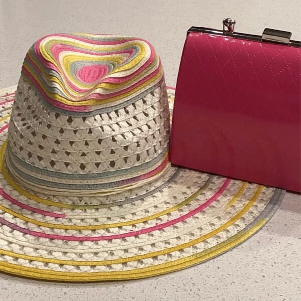 Pink clutch with pink and yellow sun hat