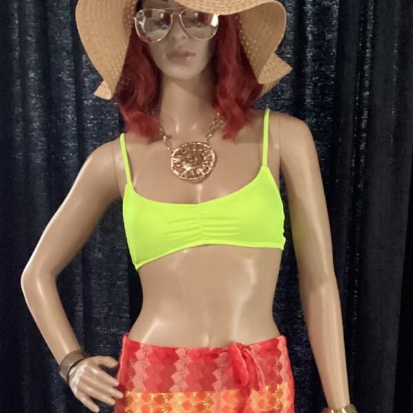 Red and coral beachwear with hat and sunglasses